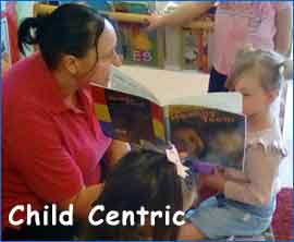 Adult and children reading together with words child centric